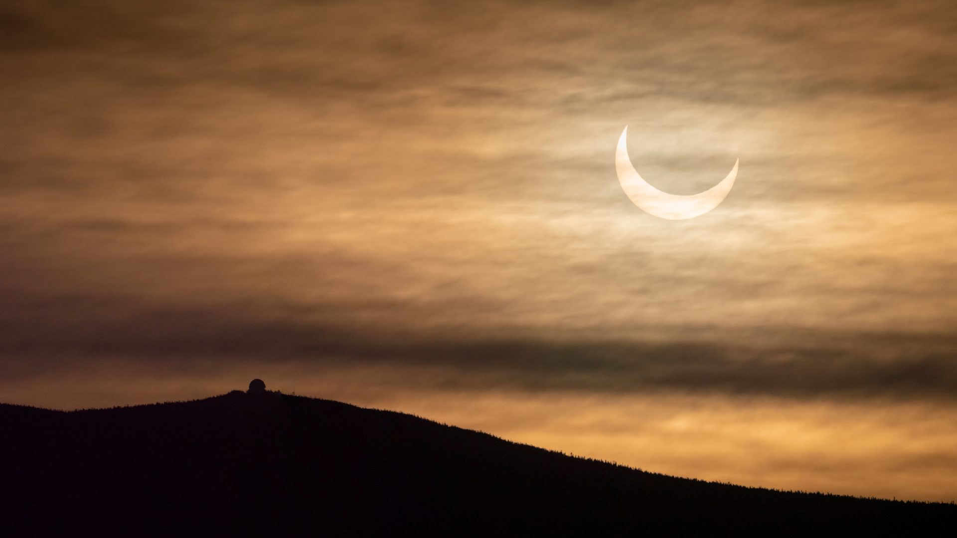 EclipseSolairePartielleOMM 2021 06 10 ©GuillaumePoulin Photo de l'éclipse partielle du 10 juin 2021, vue du parc national du Mont-Mégantic